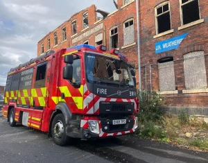 Fire fighters at the site of the fire