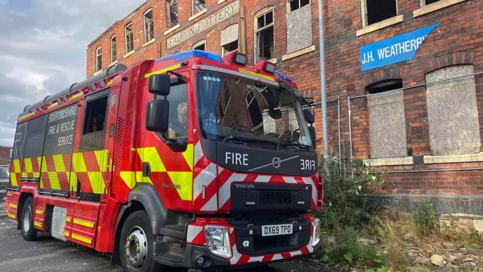 Fire fighters at the site of the fire